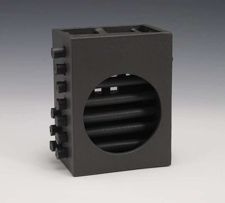 A black, ceramic slab and coil structure from Briggs' exhibition